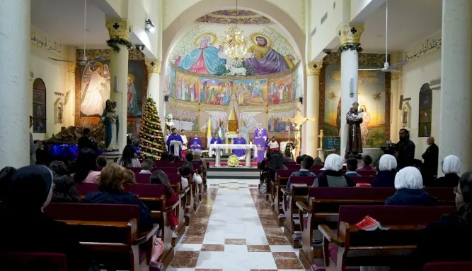 Christian Palestinians Attend Christmas Eve Mass at Church in Gaza City where They Seek Shelter